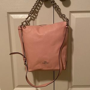 NWOT Coach bag in pink with chain handle & cross body strap. Size medium.